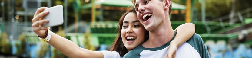 Photo of teenagers taking a selfie